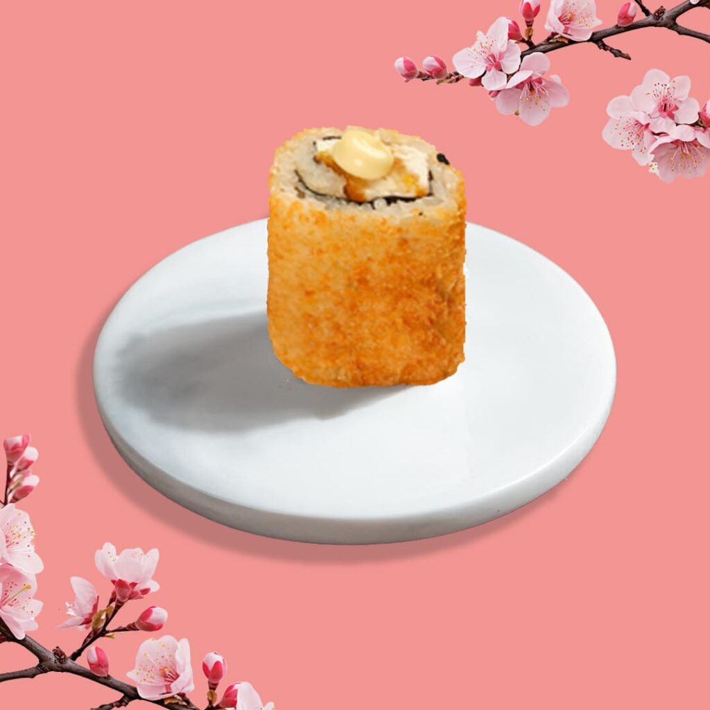 California frits avec poulet croustillant, chèvre, miel, sésame grillé et sauce teriyaki - une spécialité sucrée-salée de Tastyrice - california sushi frits